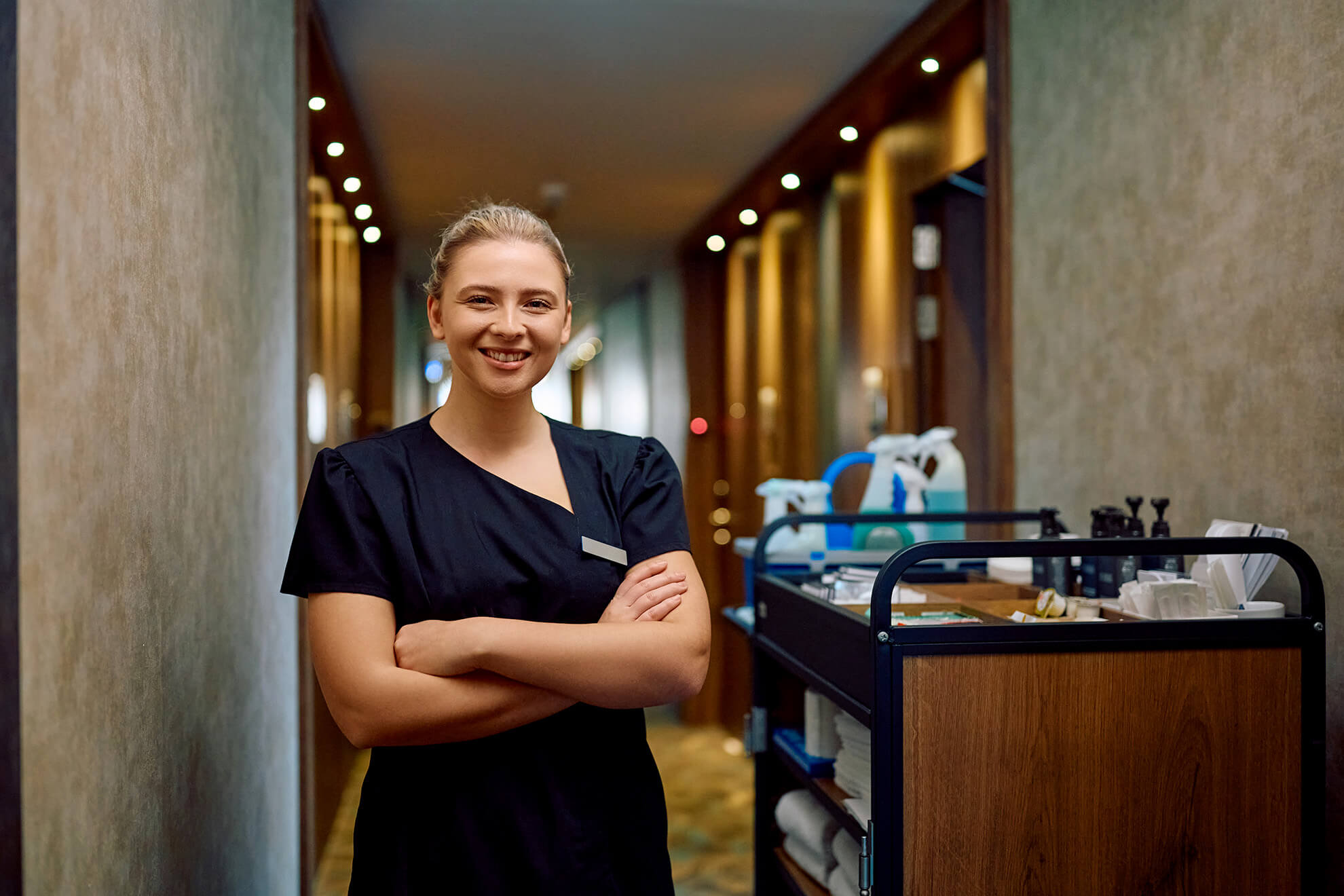 confident employee working in hotel after completing their justice for janitors training