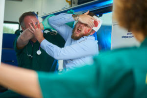 paramedic dealing with abusive patient