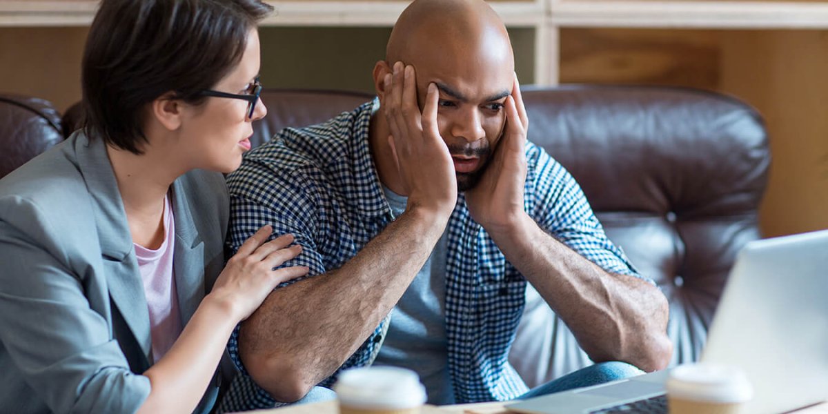 Businesswoman empathizing with her colleague